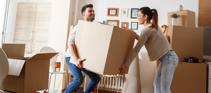 young couple moving into their first home